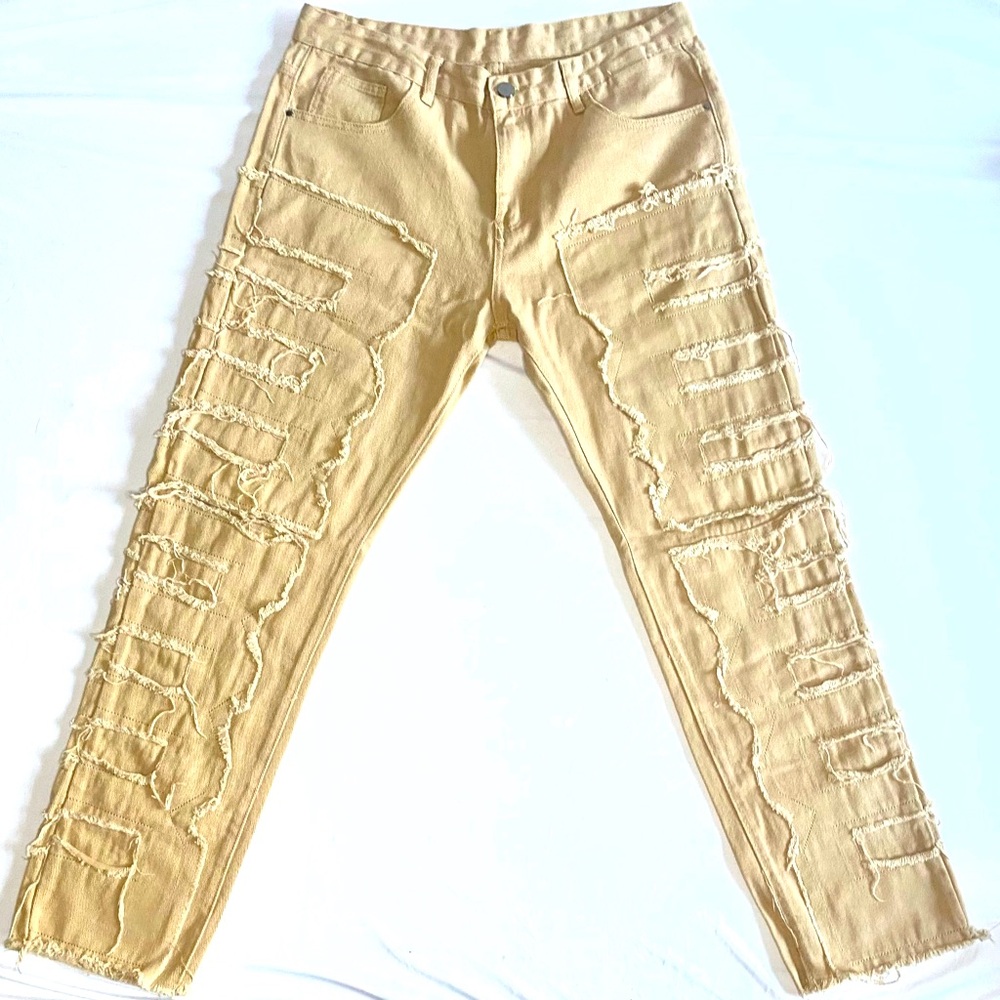 Beige men’s pants with frayed hem